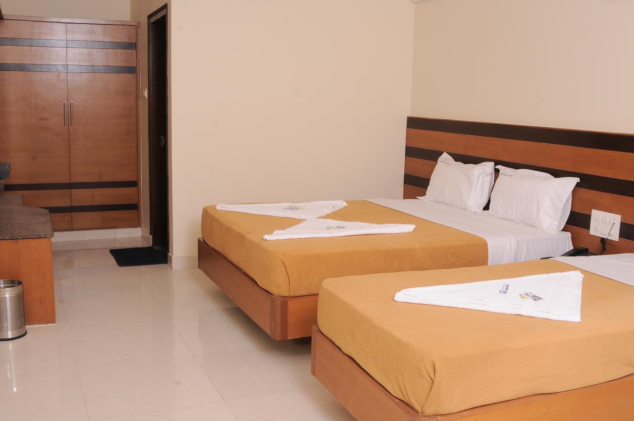 Hlv Grand Inn Bangalore Eksteriør bilde