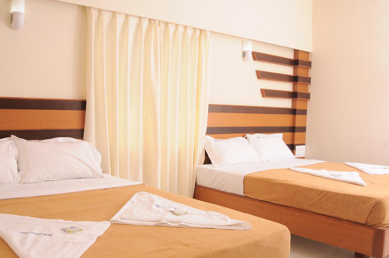 Hlv Grand Inn Bangalore Eksteriør bilde
