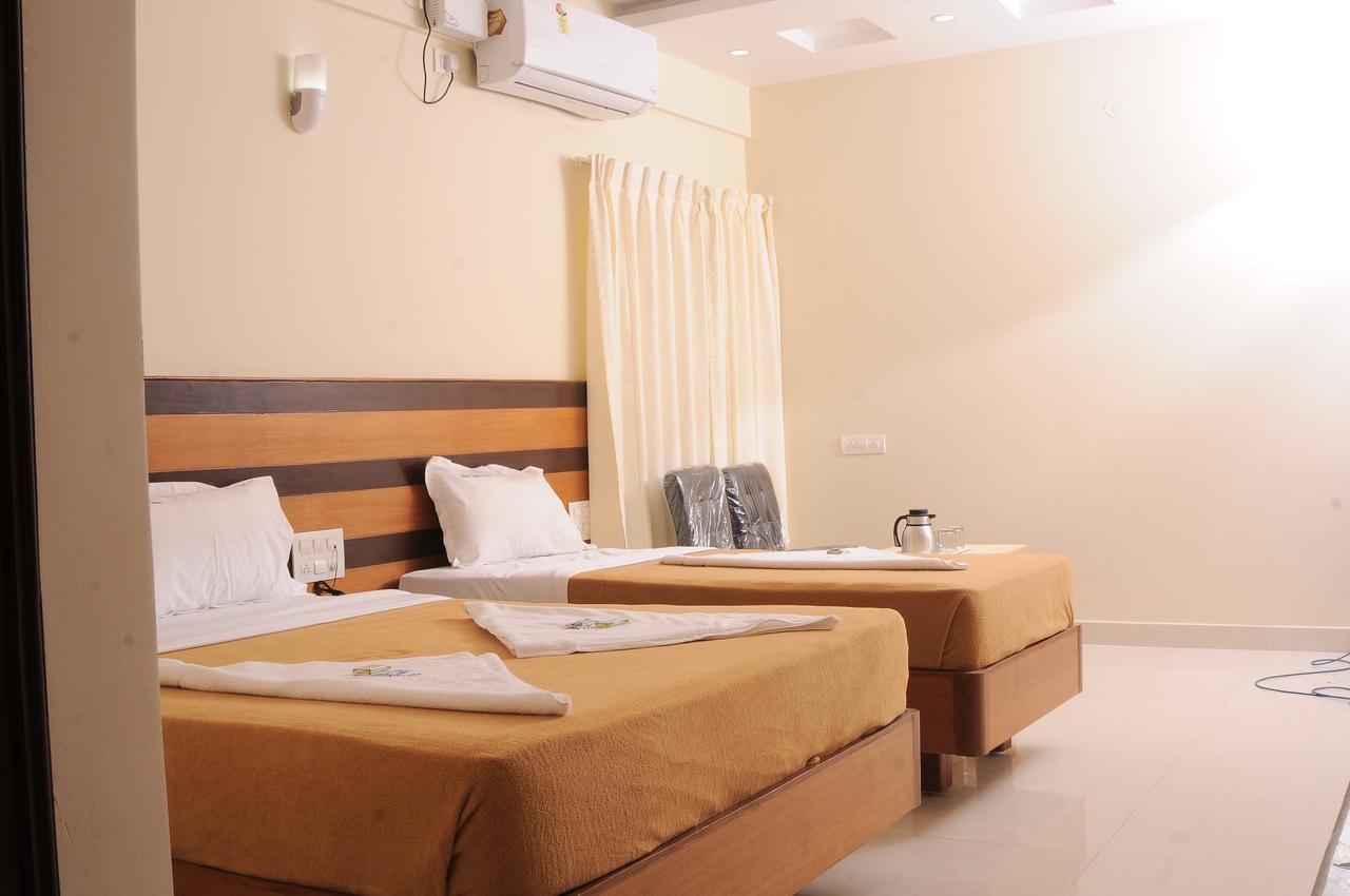 Hlv Grand Inn Bangalore Eksteriør bilde
