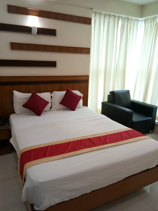 Hlv Grand Inn Bangalore Eksteriør bilde