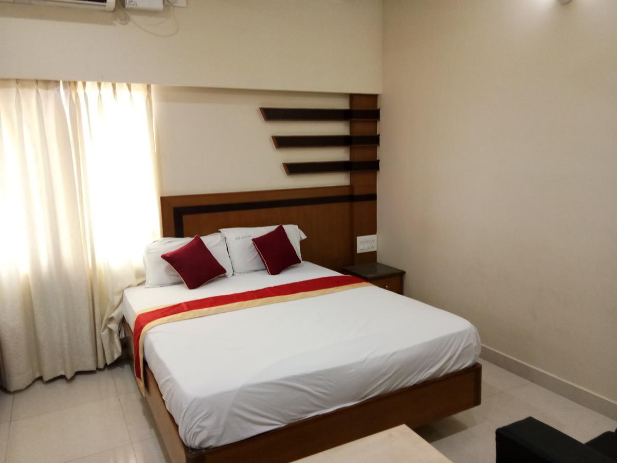 Hlv Grand Inn Bangalore Eksteriør bilde