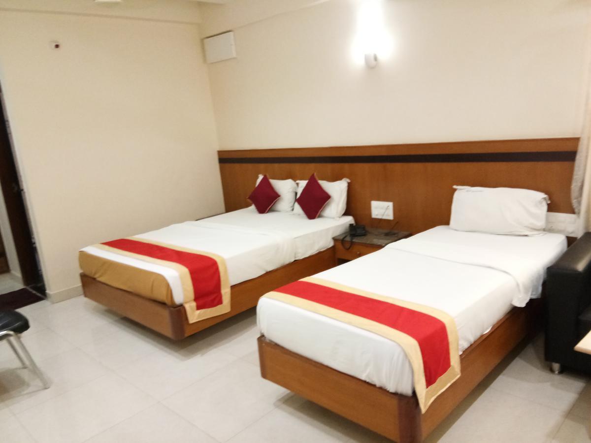 Hlv Grand Inn Bangalore Eksteriør bilde